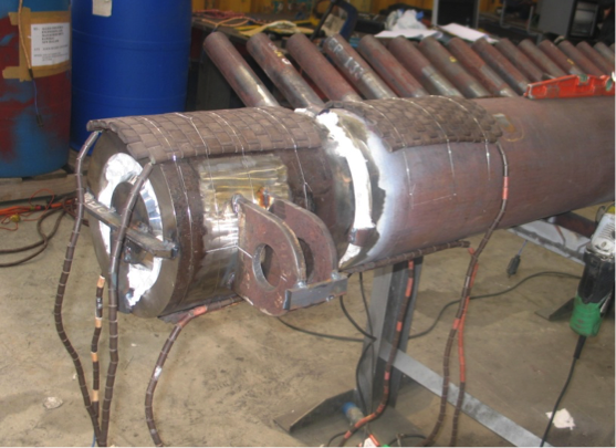 Figure 3 - Gr 91 header repair showing weld, purge and preheat set up